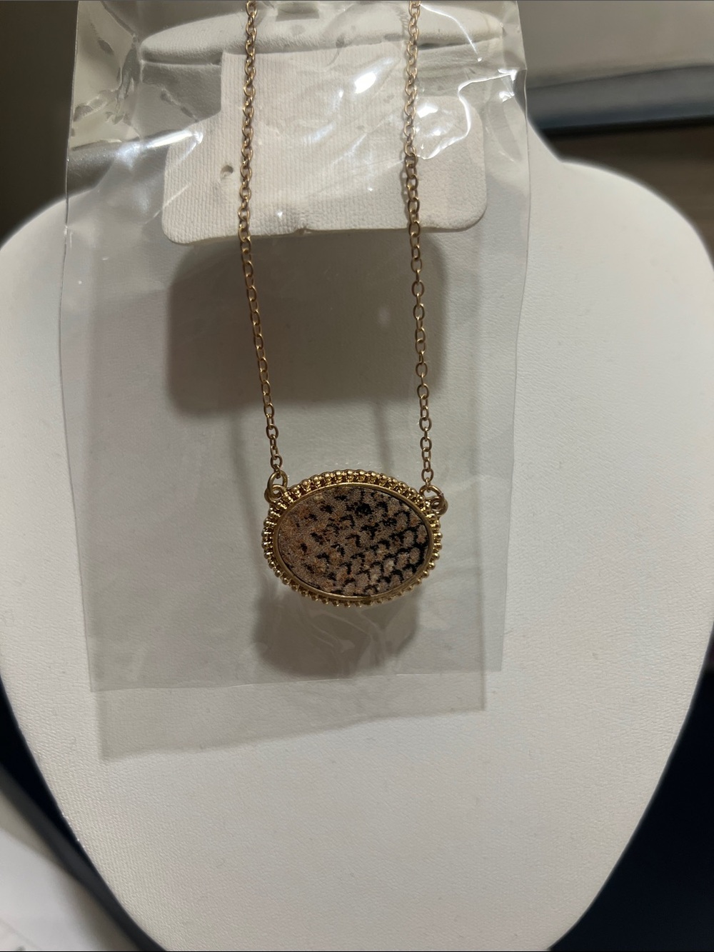 Gold Oval Pendant Necklace with Brown Textured Inset